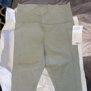 Athleta NWT Leggings SALUTATION STASH 7/8 TIGHT Fern Green M/Medium